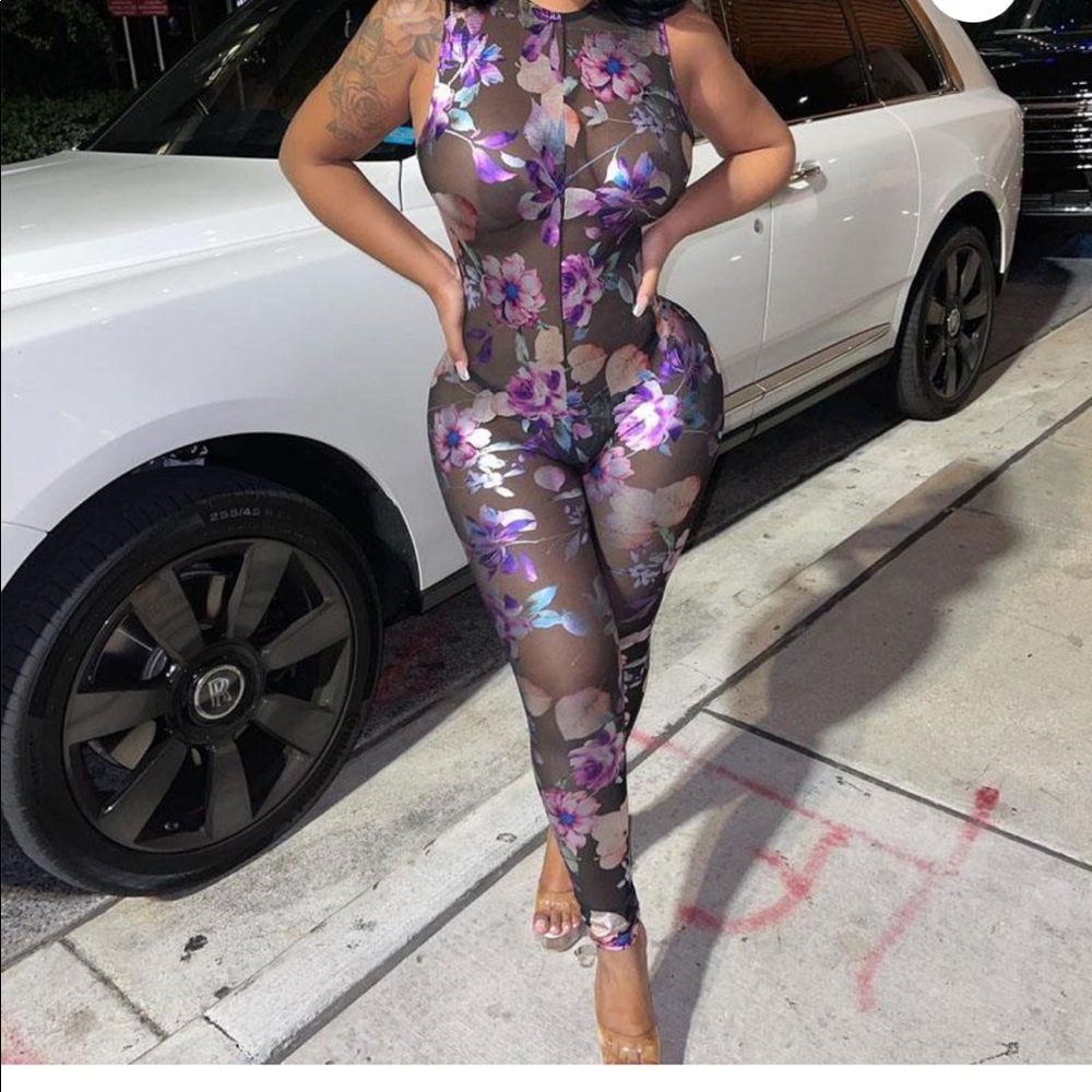 Brand new Daisy purple bodysuit
